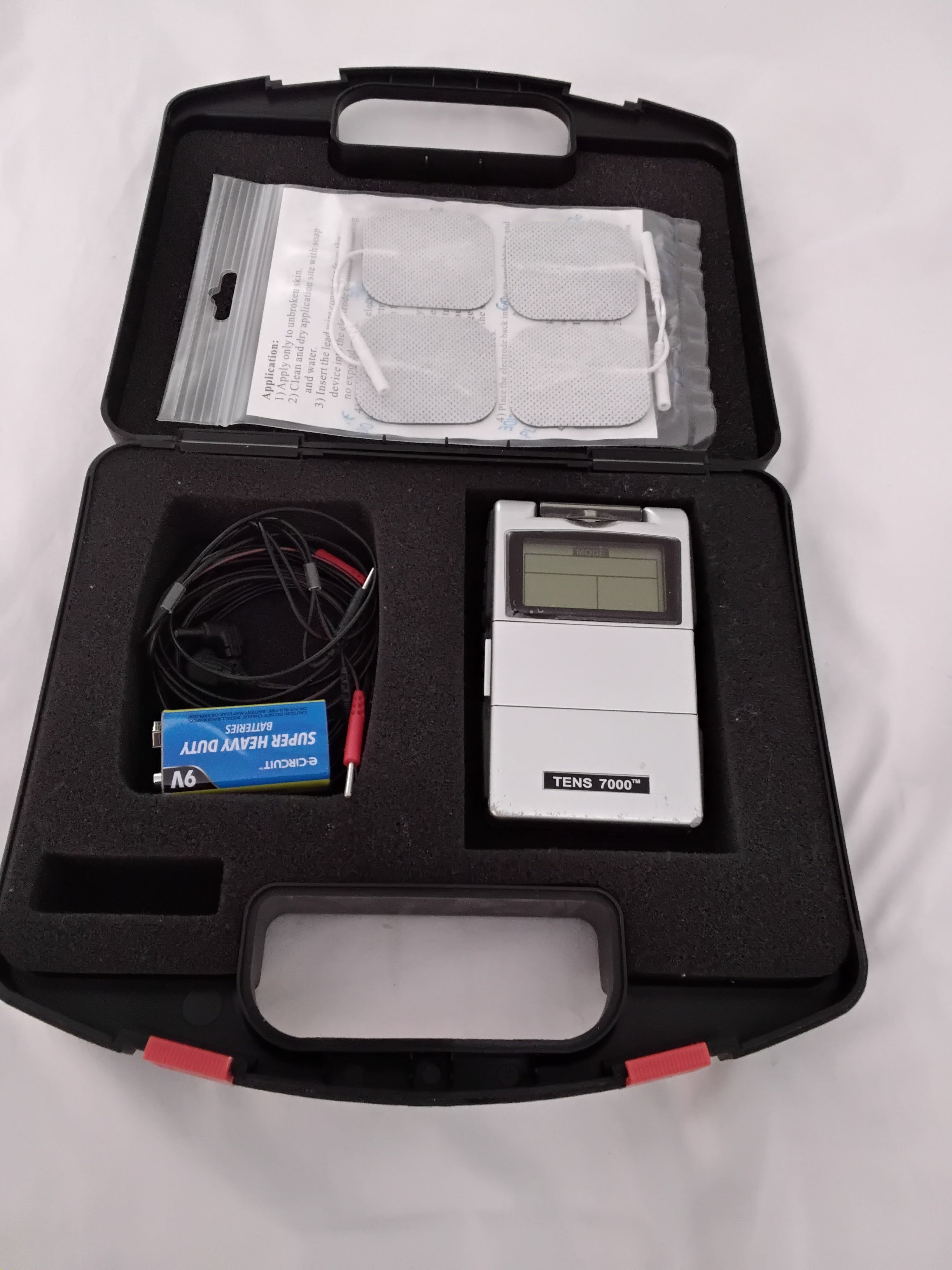 Tens 7000 electrical muscle stimulator, excellent, new transducer and battery
