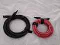 A pair of long solar cable. Estimated 20 feet each. Excellent.